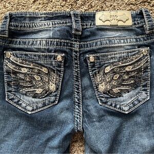 Miss Me Women’s 24 Mid Rise Slim Bootcut Bling Rhinestone Wings